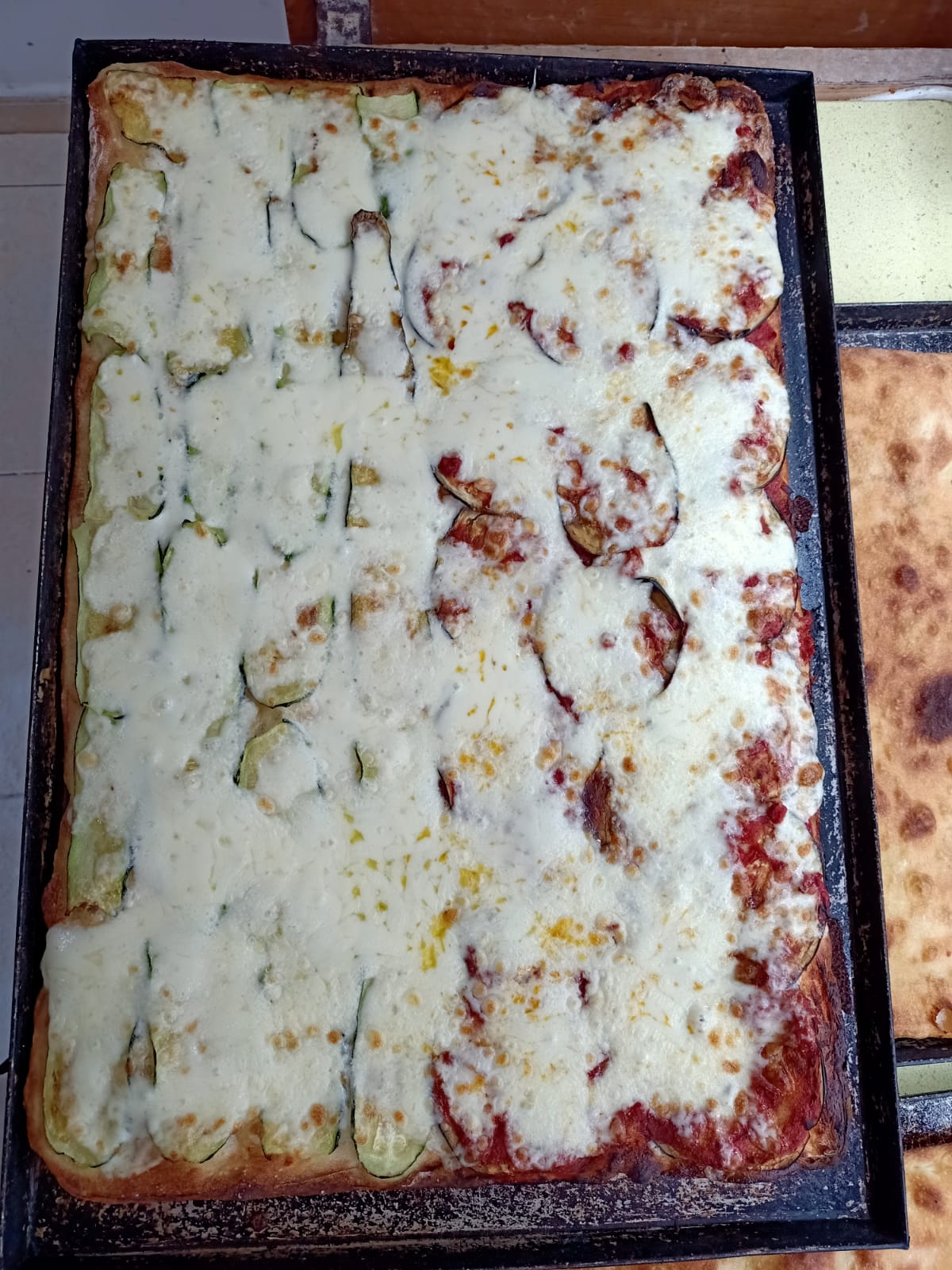 pizza parmigiana di melanzane e zucchine